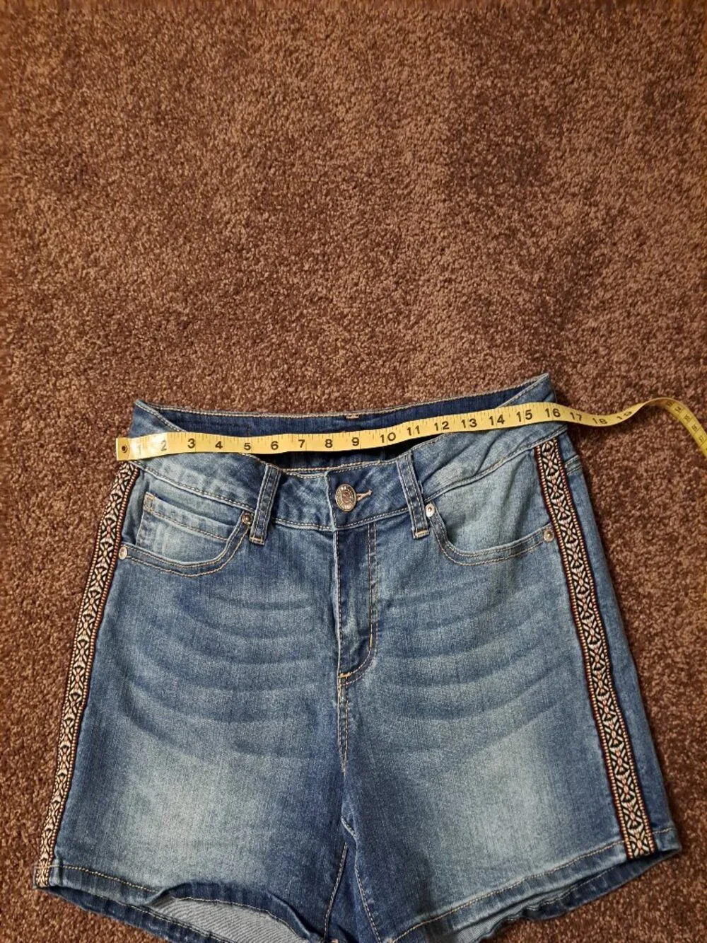 Seven7 Boho denim shorts featuring distinctive embroidered side detailing
